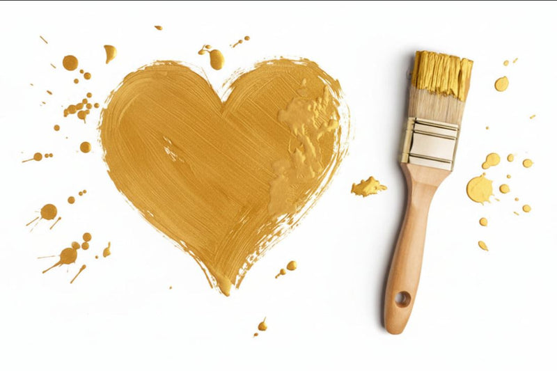 Gold heart shape with paintbrush