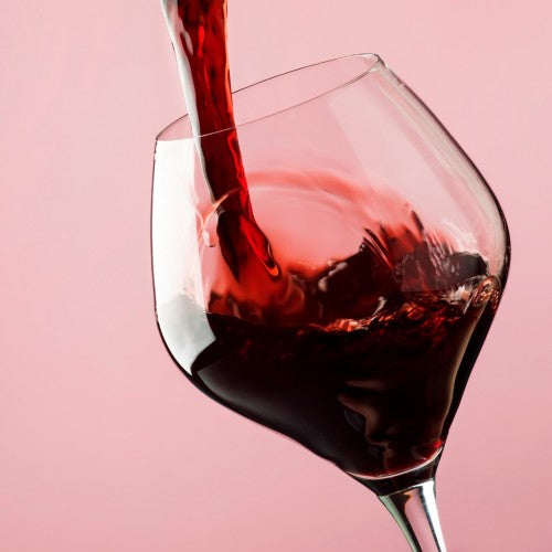 french-dry-red-wine-pours-into-glass-trendy-pink-background-picture-id1127220988-500×500