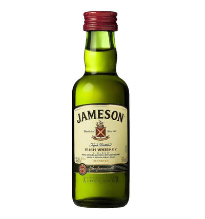 Bottle of Jameson Irish Whiskey with green glass and a cream label.