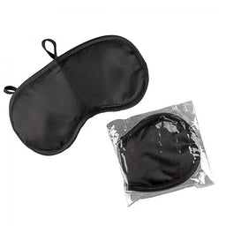 Black satin sleep mask with elastic straps, shown next to the same mask in clear plastic packaging