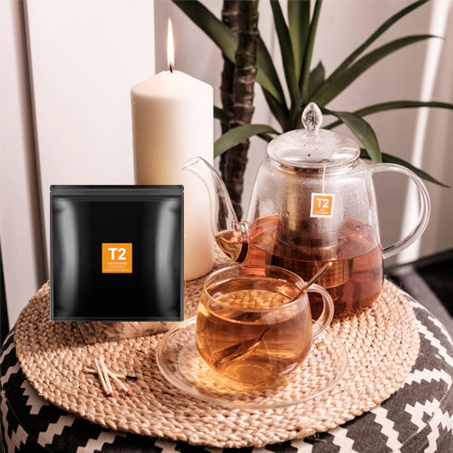 Tea-making setup with T2 tea bag, teapot, and cup