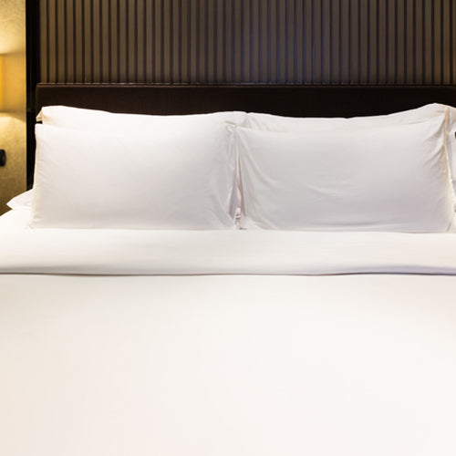 Luxury-bed-and-pillow-with-light-1048337048_727x485-500×500