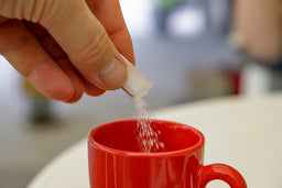 putting sugar