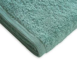 Close-up of ultra-soft frost-colored towel fabric showing its plush texture