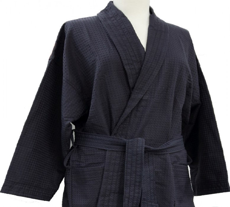 Black waffle weave bathrobe with long sleeves and belt, displayed on a mannequin torso