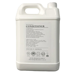 White 5-litre container of nourishing conditioner with black text label for hotel use.