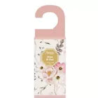 Pink floral scented door hanger air freshener in decorative packaging with flower illustrations