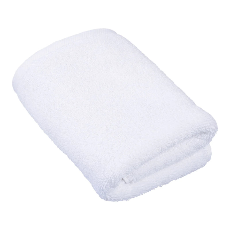 Luxurious white pearl indulgence hand towel, plush and neatly folded for bathroom or guest use.