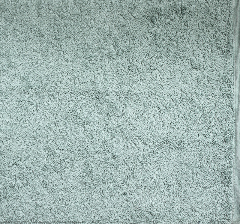 Frost-colored ultra towel folded neatly, highlighting its soft and plush texture