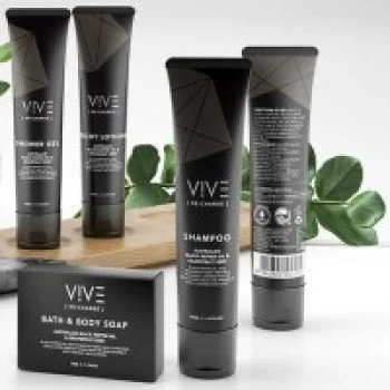 Vive brand luxury hotel toiletries including shampoo, conditioner, and bath soap in sleek black packaging.