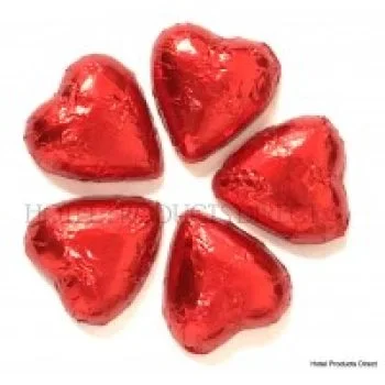 Foil-wrapped chocolate hearts in red, pink, and silver, ideal for gifts or events