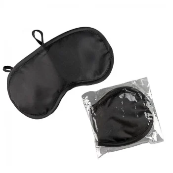 Black satin sleep mask with elastic straps, shown next to the same mask in clear plastic packaging